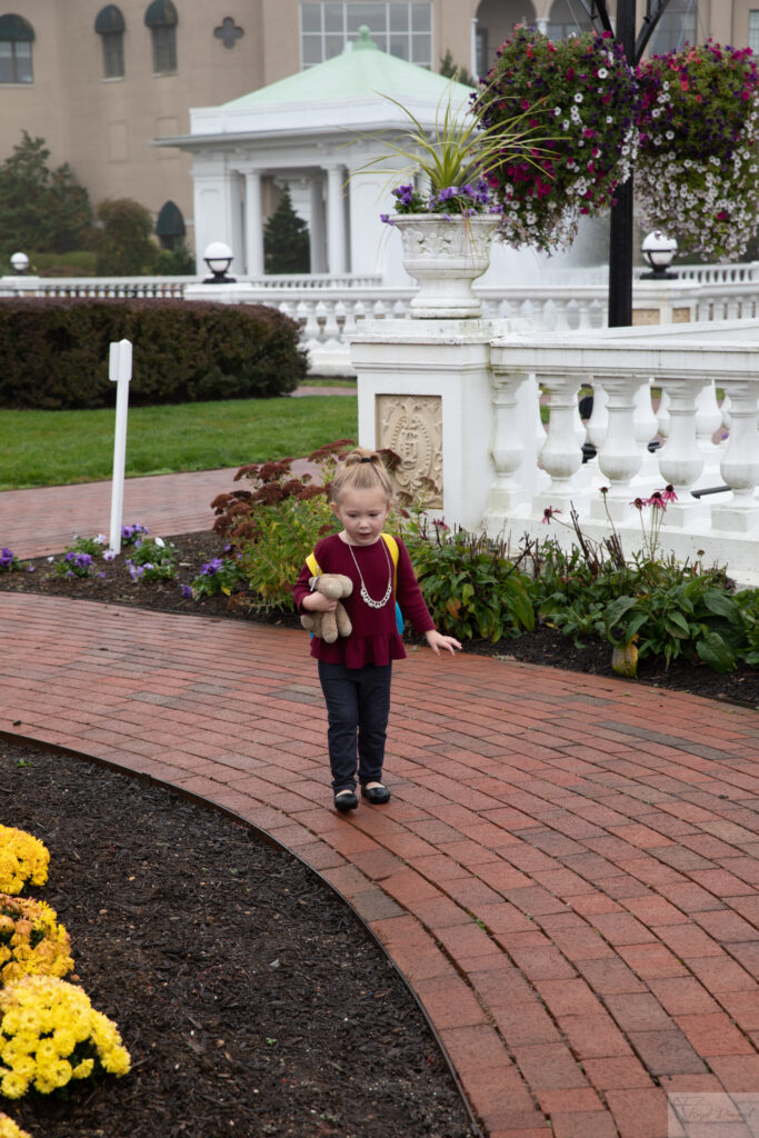 child walking down path