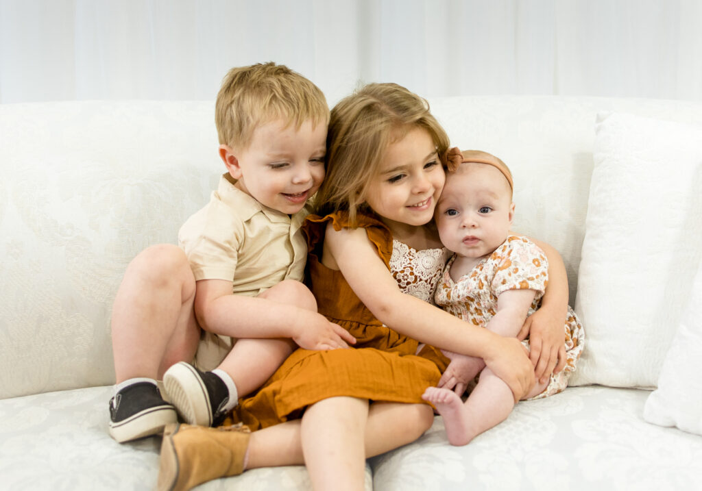 header image Children Sitting on couch