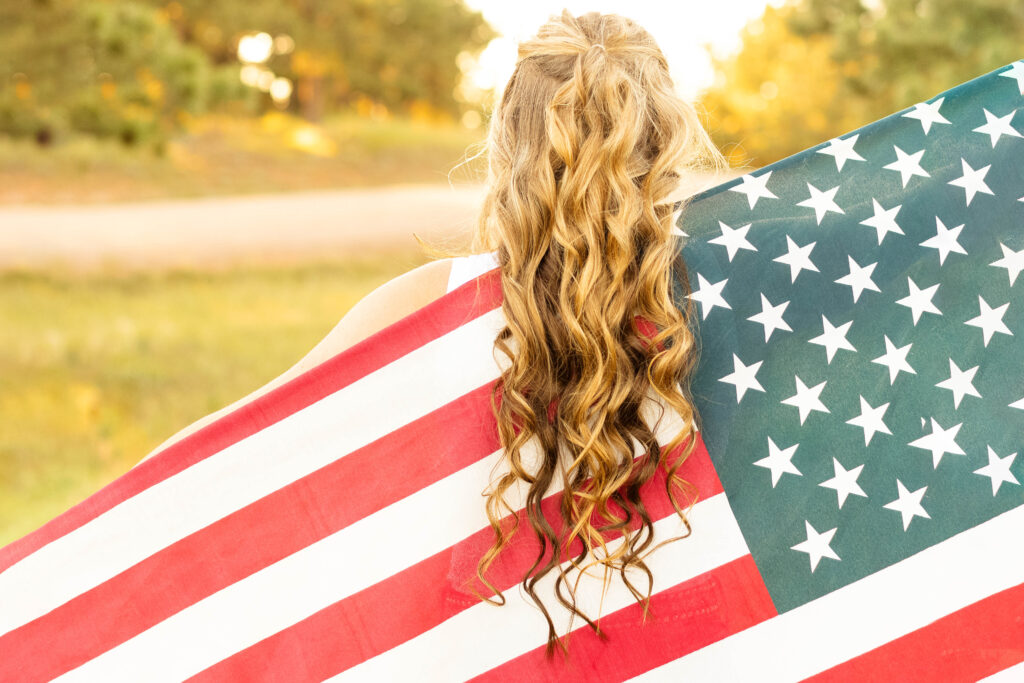 Girl Holding American flag