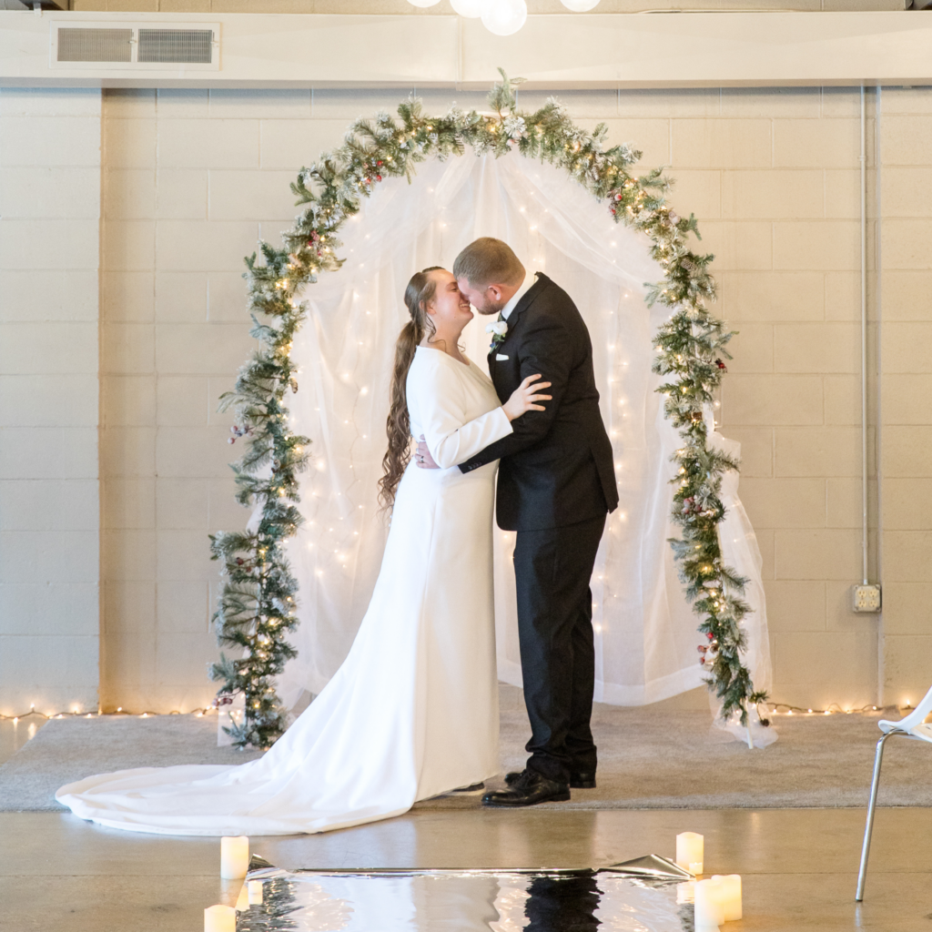 Winter Wedding First Kiss