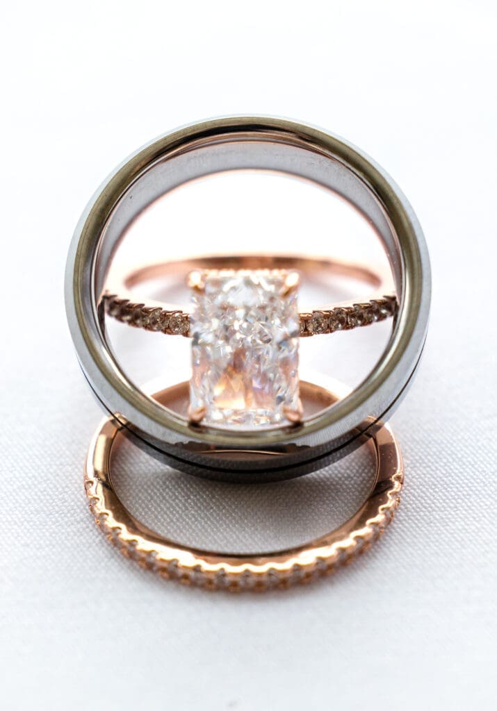 Thomas and Bailee's Wedding what details to have ready for wedding photographer — flat lay of rings shoes and invitation